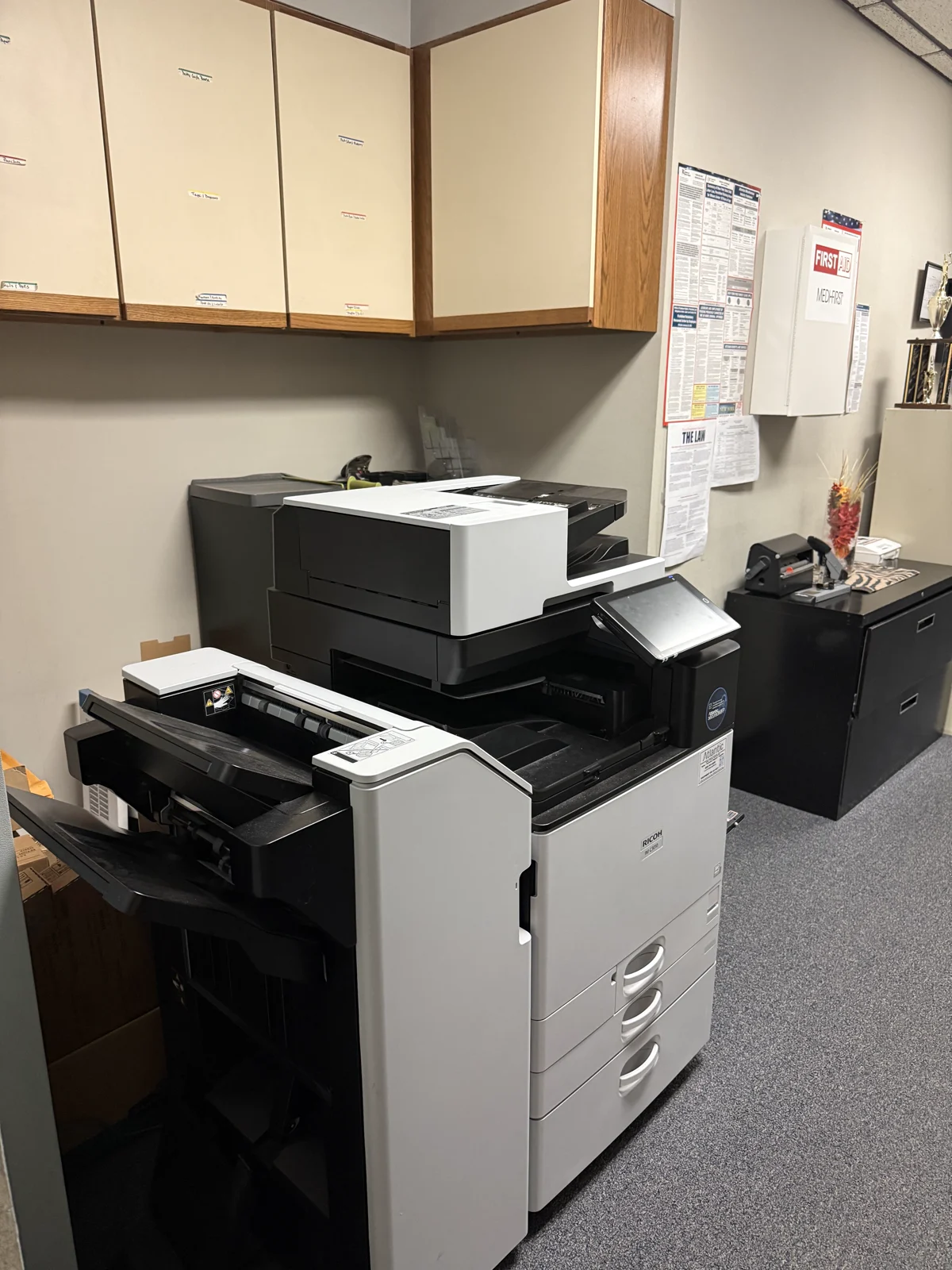 Commercial copier and finishing equipment in the Nubian Directions II Copy Center